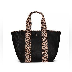 NWT. Victoria’s Secret Leopard Tote Bag. Out of stock. Top zip closure.